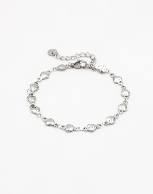 Schakelarmband kleine hartjes zilverkleurig