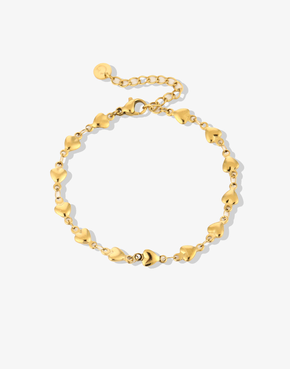 Schakelarmband kleine hartjes goudkleurig