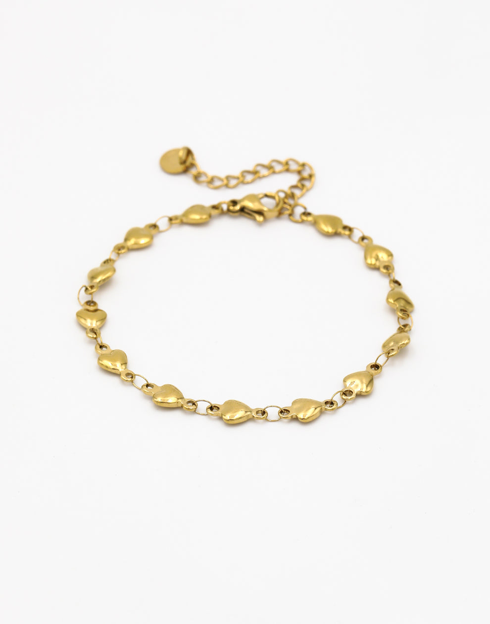 Schakelarmband kleine hartjes goudkleurig
