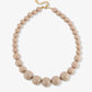 Kralenketting met verschillende groottes beige