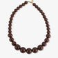 Kralenketting met verschillende groottes bruin