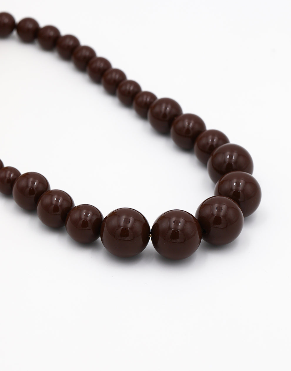 Kralenketting met verschillende groottes bruin