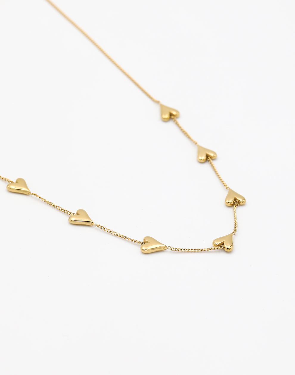 Halskette mit kleinen Vintage-Herzen in Goldfarbe