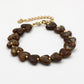 Hartjes kralenarmband bruin