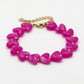Hartjes kralenarmband fuchsia