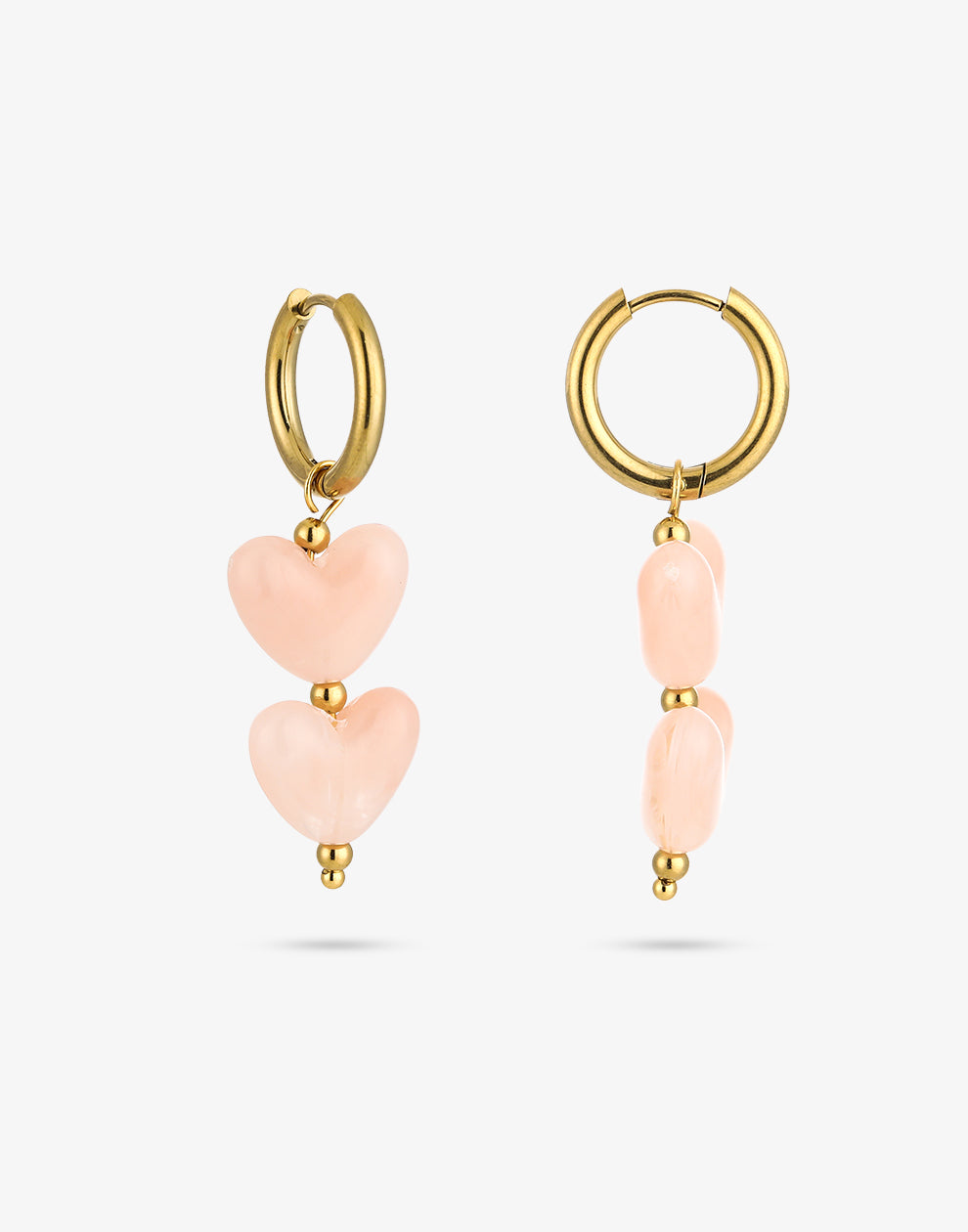 Hartjes kralenoorbellen roze