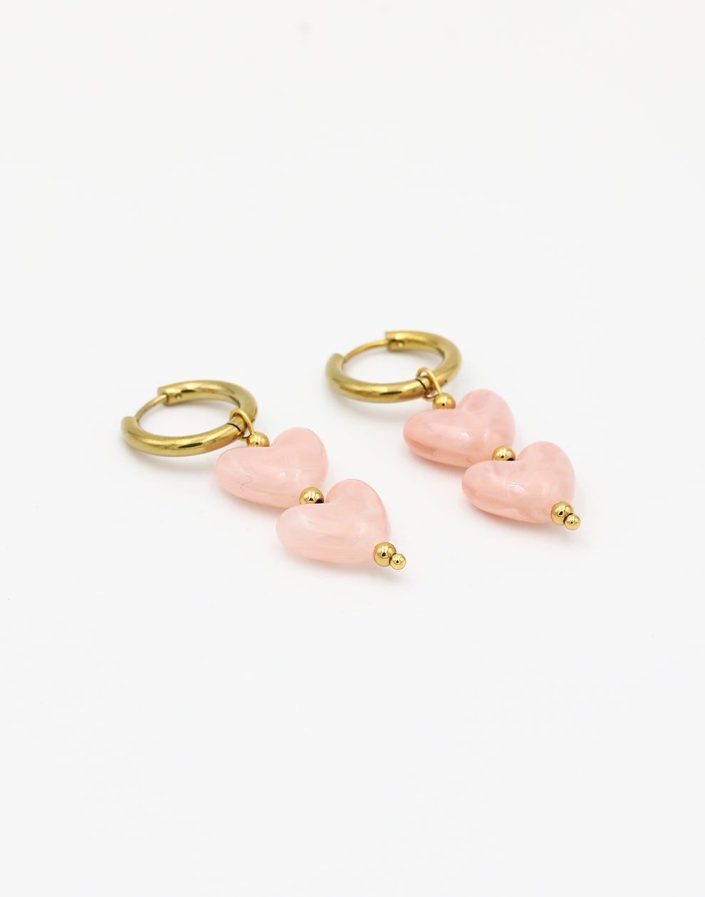 Hartjes kralenoorbellen roze