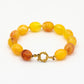 Kralenarmband ovaal lichtgeel