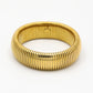 Brede bangle met geribbeld patroon goudkleurig