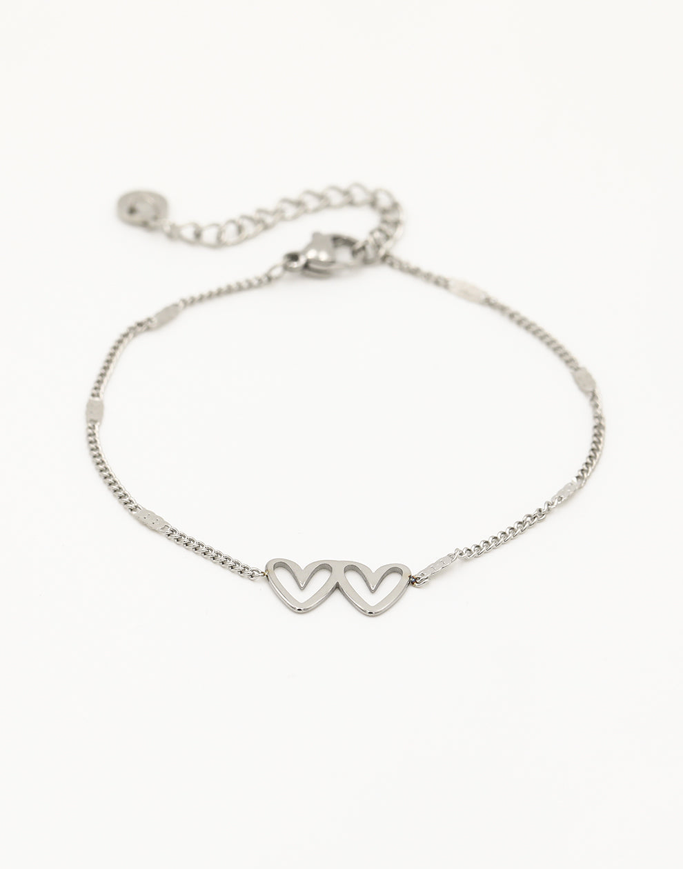 Armband dubbele hartjes met schakels zilverkleurig