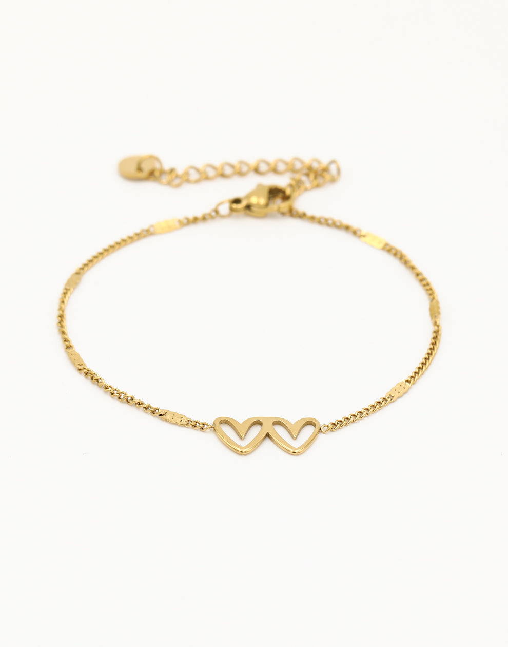 Armband dubbele hartjes met schakels goudkleurig