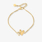 Armband verbonden speelse hartjes goudkleurig