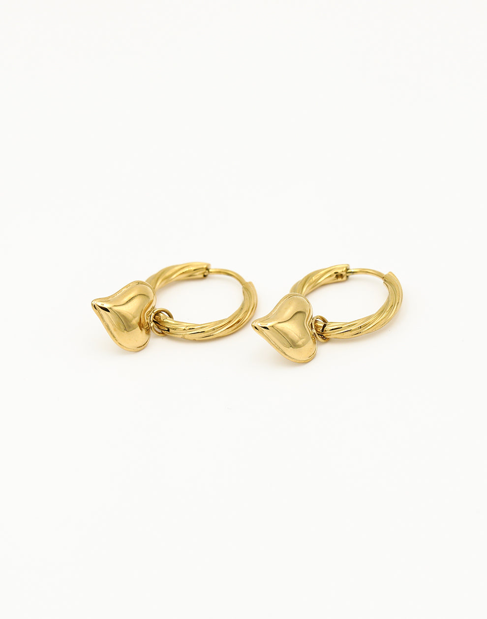 Gedraaide creolen met speels hart goudkleurig