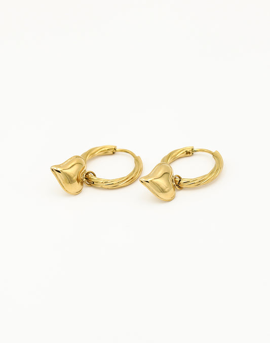 Gedraaide creolen met speels hart goudkleurig