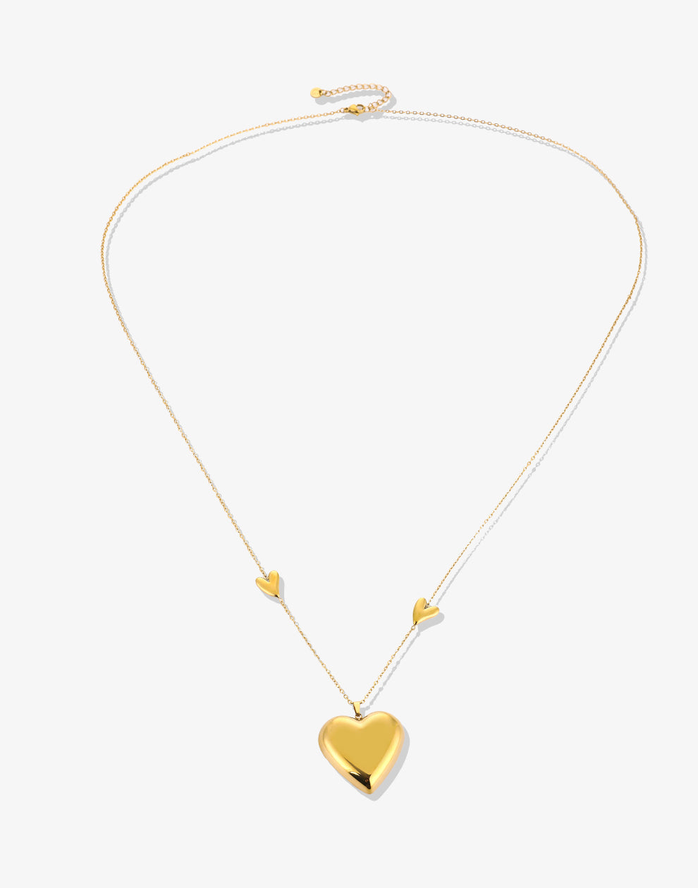 Lange ketting 3 hartjes goudkleurig