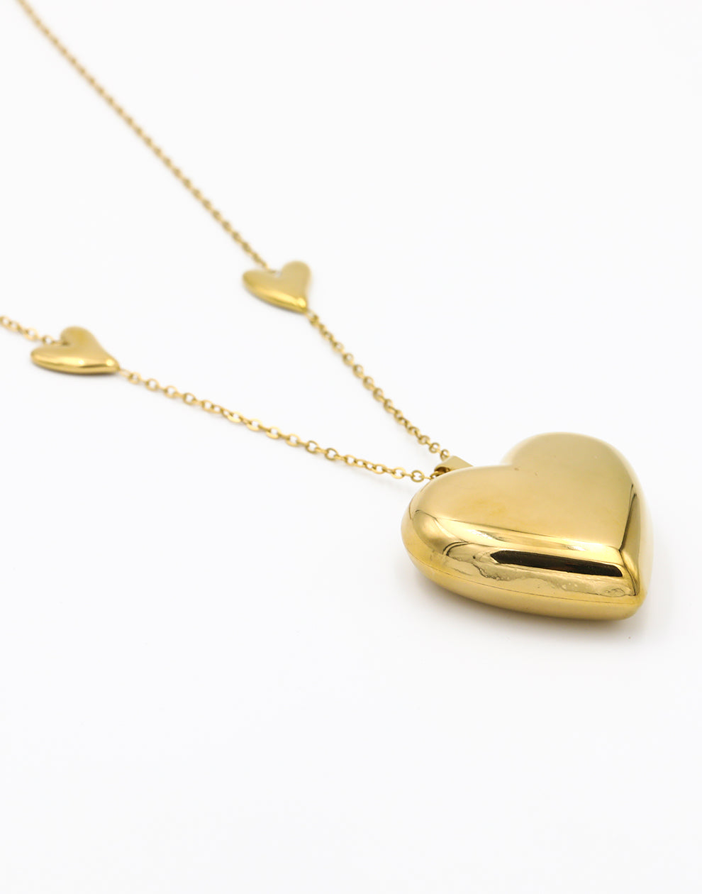 Lange ketting 3 hartjes goudkleurig