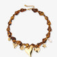 Asymmetrische kralenketting met bedels leopard