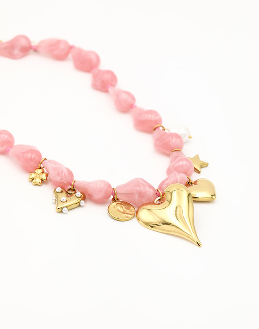 Asymmetrische kralenketting met bedels roze