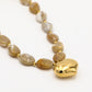 Kralenketting marble met hart beige