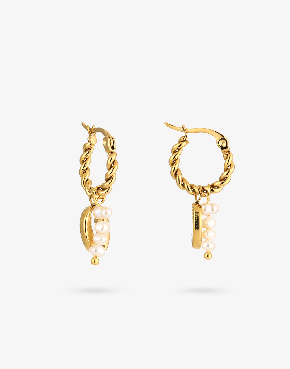 Gedraaide creolen met parels en schelp