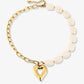 Kralenketting ovaal met schakels hart beige