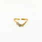 Ring wave met steentjes goudkleurig