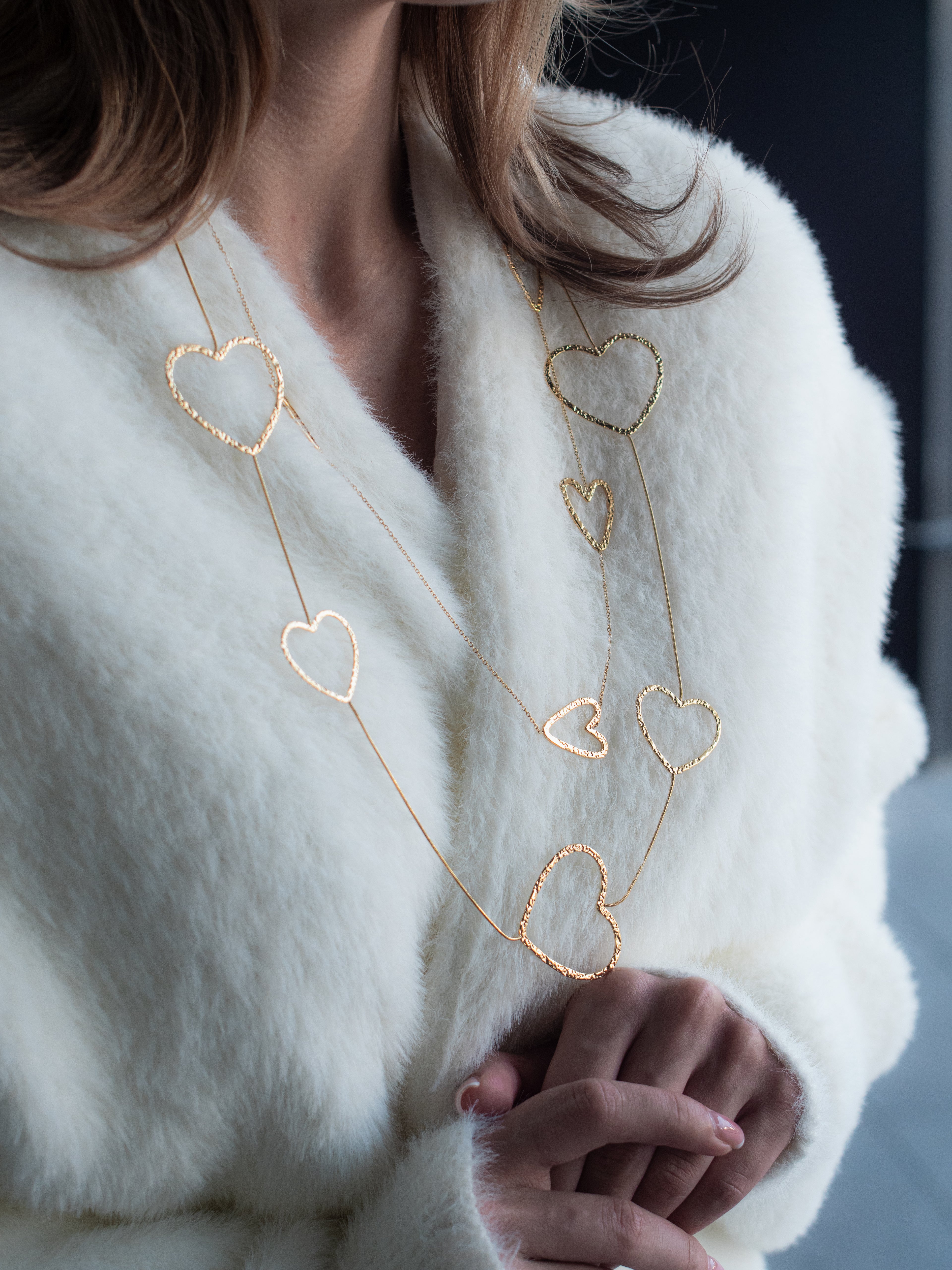 lange ketting grote harten goudkleurig