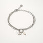 Armband dubbel hartje en parel zilverkleurig