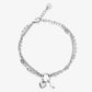 Armband dubbel hartje en parel zilverkleurig